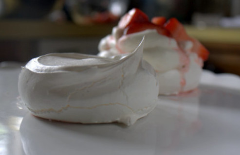 Strawberries and Cream Pavlovas with a ginger cookie crumble