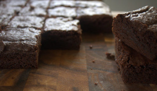 dark chocolate brownies with an ooey gooey coconut pecan icing