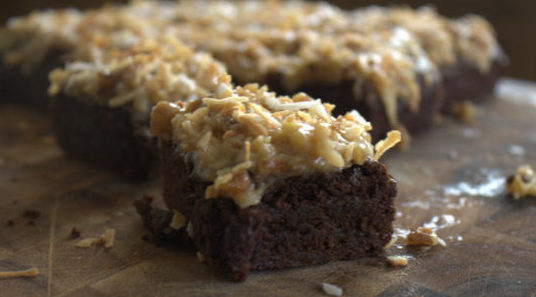 dark chocolate brownies with an ooey gooey coconut pecan icing