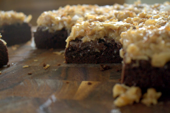 dark chocolate brownies with an ooey gooey coconut pecan icing