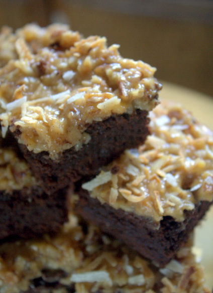 dark chocolate brownies with an ooey gooey coconut pecan icing